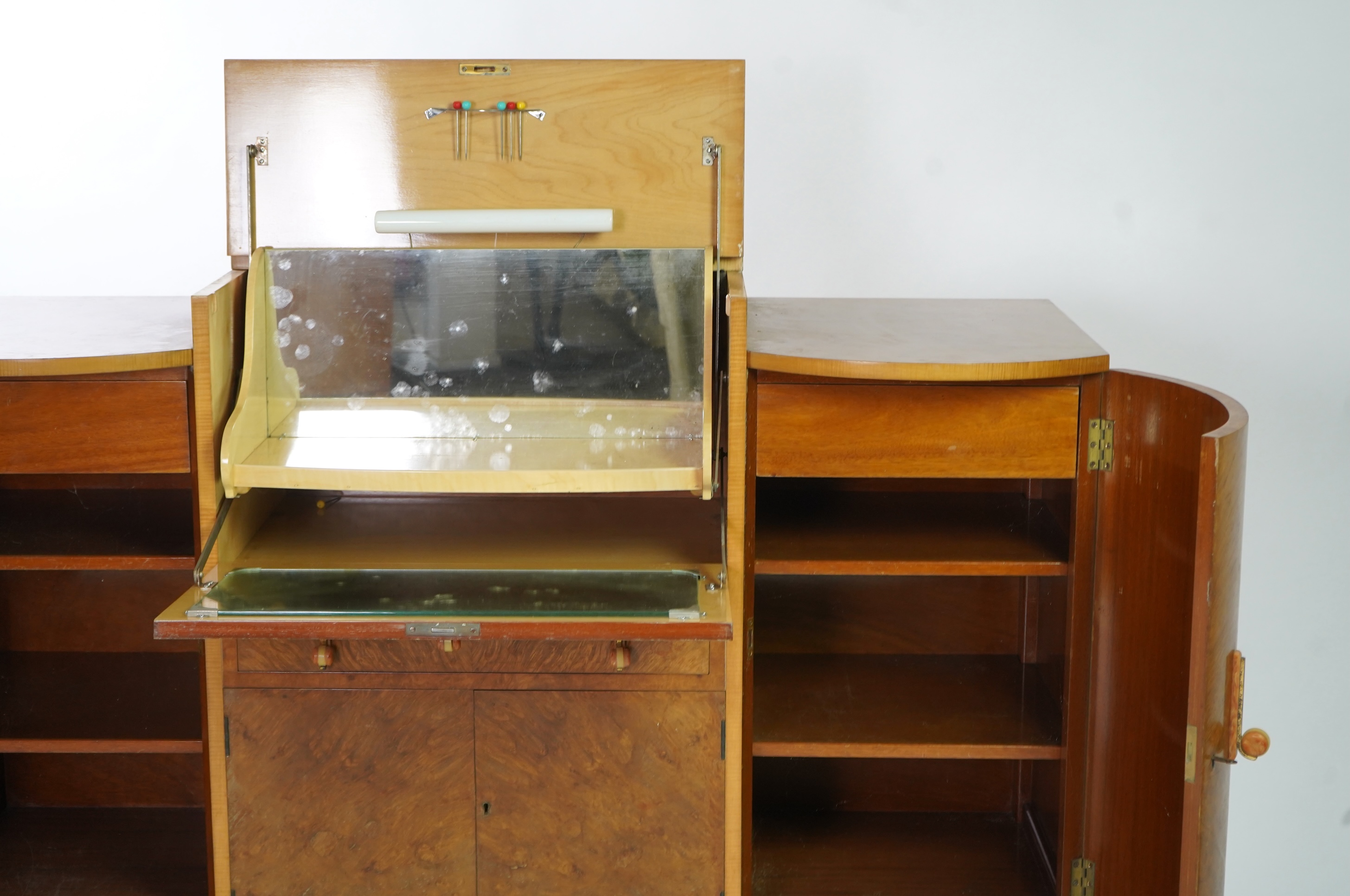 Attributed to Harry and Lou Epstein: An Art Deco burr walnut dining suite